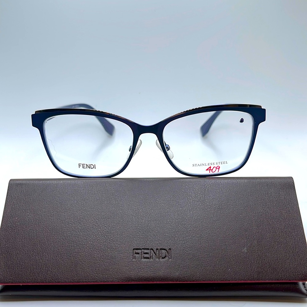 NWOT. Fendi blue metal frames with blue acetate arms with Fendi logo.